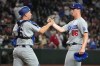 Los Angeles Dodgers catcher Will Smith (16) and pitcher Jack Dreyer celebrate after defeating the Arizona Diamondbacks in a baseball game, Wednesday, June 3, 2026, in Phoenix. (AP Photo/Rick Scuteri)