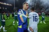 Bosnian striker Edin Dzeko, left, greets Italian midfielder Bryan Cristante after the countries' penalty shootout in Zenica, Bosnia, on Tuesday, March 31, 2026. (AP Photo/Armin Durgut)