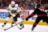 William Karlsson (71) moves the puck around Carolina Hurricanes' Sean Walker (26) during the first period in Game 5 of the NHL hockey Stanley Cup Final series in Raleigh, N.C., Thursday, June 11, 2026. (AP Photo/Karl DeBlaker)