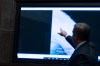 FILE - Deputy Director of Naval Intelligence Scott Bray points to a video display of a UAP during a hearing of the House Intelligence, Counterterrorism, Counterintelligence, and Counterproliferation Subcommittee hearing on 