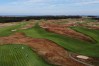 FILE - Golfers tee off the first hole at Shinnecock Hills Golf Club in Southampton, N.Y., Sept. 15, 2025. (AP Photo/Seth Wenig, File)