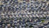 FILE - This April 13, 2019, photo, shows rows of homes, in suburban Salt Lake City. (AP Photo/Rick Bowmer, File)