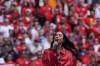 Alanis Morisette performs the Canadian national anthem during the World Cup Group B soccer match between Canada and Bosnia in Toronto, Friday, June 12, 2026. (AP Photo/Stephanie Scarbrough)