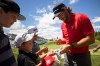 Matthew Anderson, of Mississauga, Ont., signs autographs after finishing the second round of the RBC Canadian Open in Caledon, Ont., on Friday, June 12, 2026. THE CANADIAN PRESS/Nick Iwanyshyn