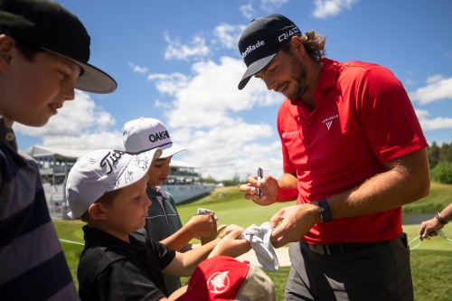 Matthew Anderson, of Mississauga, Ont., signs autographs after finishing the second round of the RBC Canadian Open in Caledon, Ont., on Friday, June 12, 2026. THE CANADIAN PRESS/Nick Iwanyshyn