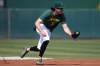 Athletics shortstop Jacob Wilson warms up before a baseball game against the New York Yankees Friday, May 29, 2026, in West Sacramento, Calif. (AP Photo/Scott Marshall)