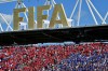 Fans of both teams cheer under a FIFA sign in the stands during group B World Cup soccer action between Canada and Bosnia and Herzegovina, in Toronto, Friday, June 12, 2026. THE CANADIAN PRESS/Sammy Kogan