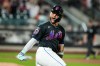 New York Mets' Bo Bichette (19) celebrates a solo home run during the second inning of a baseball game against the Atlanta Braves, Friday, June 12, 2026, in New York. (AP Photo/Eduardo Munoz Alvarez)