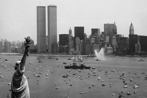 FILE - Ships participate in Operation Sail between the Statue of Liberty and the World Trade Center to celebrate the U.S. bicentennial in New York on July 4, 1976. (AP Photo/Eddie Adams, File)
