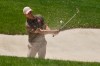 Adam Scott, of Australia, hits out of a bunker on the 18th hole during the first round of the Memorial golf tournament in Dublin, Ohio, Thursday, June 4, 2026. (AP Photo/Sue Ogrocki)