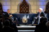 Prime Minister Mark Carney, left, speaks with Alex White at Trinity College in Dublin, on Saturday, June 13, 2026. THE CANADIAN PRESS/Christopher Katsarov