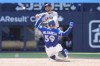 New York Yankees shortstop Jose Caballero turns a double play to end the sixth inning as Blue Jays catcher Brandon Valenzuela slides into second base during a Major League Baseball game in Toronto on June 13, 2026. THE CANADIAN PRESS/Frank Gunn