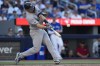 New York Yankees' Paul Goldschmidt (48) hits a two-run home run against the Toronto Blue Jays during ninth inning MLB baseball action in Toronto, Saturday, June 13, 2026. THE CANADIAN PRESS/Frank Gunn