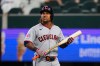 Cleveland Guardians' José Ramírez walks to the dugout after lining out to short in the eighth inning of a baseball game against the Texas Rangers in Arlington, Texas, Sunday, June 7, 2026. (AP Photo/Tony Gutierrez)