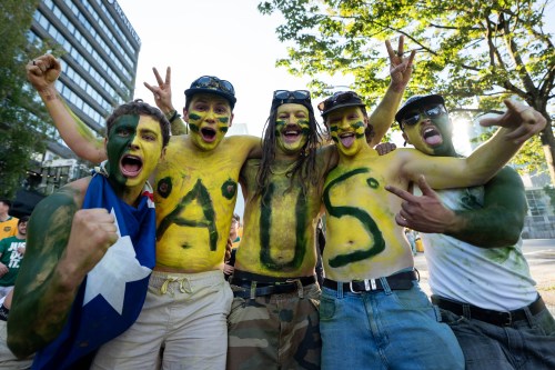 Australia fans march to the entrance of B.C. Place before the first half of a World Cup Group D soccer match, in Vancouver, on Saturday, June 13, 2026. THE CANADIAN PRESS/Ethan Cairns