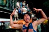 New York Knicks fans celebrate their victory after Game 5 of the NBA Finals basketball series against the San Antonio Spurs, Saturday, June 13, 2026, in New York. (AP Photo/Heather Khalifa)