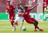 Bosnia-Herzegovina's Ivan Basic (13) and Canada's Jonathan David (10) vie for the ball during the second half of a World Cup Group B soccer match, in Toronto, on Friday, June 12, 2026. THE CANADIAN PRESS/Nathan Denette