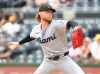 Miami Marlins starting pitcher Max Meyer (23) throws to the Pittsburgh Pirates during the first inning of a baseball game, Sunday, June 14, 2026, in Pittsburgh. (AP Photo/Philip G. Pavely)