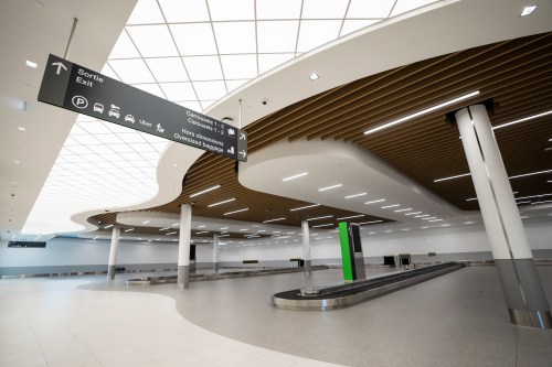 The luggage carousels of the new commercial terminal of the Montreal Metropolitan Airport is seen in Longueuil, Que., on Tuesday, March 24, 2026. THE CANADIAN PRESS/Christopher Katsarov