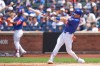 New York Mets' A.J. Ewing hits a two-run double during the first inning of a baseball game against the Atlanta Braves, Sunday, June 14, 2026, in New York. (AP Photo/Seth Wenig)