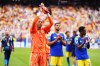 Curaçao goalkeeper Eloy Room and his teammates applaud the fans at the end of the World Cup Group E soccer match between Germany and Curacao in Houston, Sunday, June 14, 2026. (AP Photo/Karen Warren)