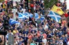 Scotland soccer fans take part in the Tartan Army March, making their way to Fenway Park ahead of a baseball game between the Boston Red Sox and the Texas Rangers, Sunday, June 14, 2026, in Boston. (AP Photo/Mark Stockwell)