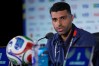 Iran's Mehdi Taremi speaks during a press conference ahead of his FIFA World Cup match against New Zealand in Inglewood, Calif., near Los Angeles, Sunday, June 14, 2026. (AP Photo/Andre Penner)