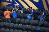 Japan fans clean up trash in the stadium following the World Cup Group F soccer match between the Netherlands and Japan in Arlington, Texas, near Dallas, Sunday, June 14, 2026. (AP Photo/Jessica Tobias)