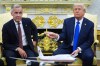 FILE - President Donald Trump and Canadian Prime Minister Mark Carney meet in the Oval Office of the White House, Oct. 7, 2025, in Washington. (AP Photo/Evan Vucci, File)