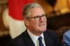 Britain's Prime Minister Keir Starmer and Japan's Prime Minister Sanae Takaichi, not pictured, attend a business roundtable meeting in Downing Street in London, Sunday, June 14, 2026. (Toby Shepheard/Pool Photo via AP)