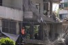 A rescue worker checks an apartment that was hit in an Israeli airstrike in Dahiyeh, Beirut's southern suburbs, Lebanon, Sunday, June 14, 2026. (AP Photo/Bilal Hussein)