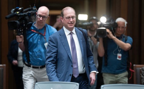 Cameras follow Canada's Ambassador to the United States Mark Wiseman as he arrives at the Standing Committee on Foreign Affairs and International Development on Parliament Hill in Ottawa, Thursday, April 23, 2026. THE CANADIAN PRESS/Adrian Wyld