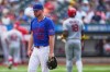 New York Mets pitcher Christian Scott reacts as he leaves during the fifth inning of a baseball game against the St. Louis Cardinals Thursday, June 11, 2026, in New York. (AP Photo/Frank Franklin II)