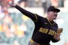 San Diego Padres pitcher Ron Marinaccio throws during the ninth inning of a baseball game against the Baltimore Orioles, Saturday, June 13, 2026, in Baltimore. (AP Photo/Daniel Kucin Jr.)