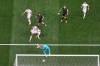New Zealand's Elijah Just (11), center, scores their opening goal during the World Cup Group G soccer match between Iran and New Zealand in Inglewood, Calif., near Los Angeles, Monday, June 15, 2026. (AP Photo/Mark J. Terrill)