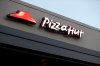 FILE - This Dec. 15, 2016, file photo shows a Pizza Hut restaurant in New Orleans. (AP Photo/Gerald Herbert, File)