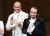 FILE - Lin-Manuel Miranda, right, takes his final performance curtain call with cast member Christopher Jackson after a performance of 