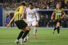 FILE - Real Madrid's Kylian Mbappe, center, controls the ball as Kairat's Alyaksandr Martynovich tries to stop him during the Champions League opening phase soccer match between Kairat Almaty and Real Madrid at Ortalyk stadium in Almaty, Kazakhstan, Sept. 30, 2025. (AP Photo/Alikhan Sariyev, File)