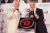 Don Cherry, left, and Ron MacLean pose with their plaque as they are inducted into Canada's Walk of Fame during an event in Toronto on Saturday, November 7, 2015. THE CANADIAN PRESS/Chris Young