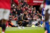 FILE - Manchester United's head coach Ruben Amorim watches from the sideline during the English Premier League soccer match between Manchester United and Sunderland at Old Trafford stadium in Manchester, England, Oct. 4, 2025. (AP Photo/Dave Thompson, file)