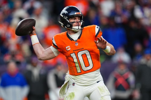 FILE - Denver Broncos quarterback Bo Nix throws during the second half of an NFL divisional round playoff football game against the Buffalo Bills, Jan. 17, 2026, in Denver. (AP Photo/Jack Dempsey, File)