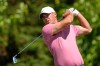 Brooks Koepka watches his tee shot on the 15th hole during a practice round for the U.S. Open golf tournament at Shinnecock Hills Golf Club in Southampton, N.Y., Tuesday, June 16, 2026.(AP Photo/Gerald Herbert)