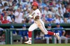 Washington Nationals' Nasim Nuñez heads to home for a score during the third inning of a baseball game against the Kansas City Royals, Tuesday, June 16, 2026, in Washington. (AP Photo/John McDonnell)