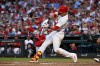 St. Louis Cardinals' Lars Nootbaar hits a sacrifice fly in the fifth inning of a baseball game against the San Diego Padres, Tuesday, June 16, 2026, in St. Louis. (AP Photo/Joe Puetz)