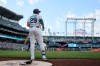 Seattle Mariners' Cal Raleigh prepares to bat against the Baltimore Orioles during the first inning after his return from the injured list in a baseball game, Tuesday, June 16, 2026, in Seattle. (AP Photo/John Froschauer)