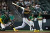 Pittsburgh Pirates' Brandon Lowe hits a solo home run during the ninth inning of a baseball game against the Athletics, Tuesday, June 16, 2026, in West Sacramento, Calif. (AP Photo/Scott Marshall)