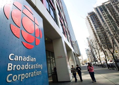 People walk near the CBC building in Toronto on April 4, 2012.THE CANADIAN PRESS/Nathan Denette