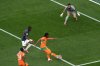 Ivory Coast's Elye Wahi, center, shoots against Ecuador goalkeeper Hernan Galindez during the World Cup Group E soccer match between Ivory Coast and Ecuador in Philadelphia, Sunday, June 14, 2026. (AP Photo/Matt Rourke)