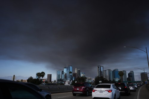 The sky is filled with smoke from a warehouse fire in Los Angeles on Wednesday, June 17, 2026. (AP Photo/Jae C. Hong)
