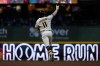 Milwaukee Brewers' Jackson Chourio gestures as he rounds the bases after hitting a two-run home run during the fourth inning of a baseball game against the Cleveland Guardians, Wednesday, June 17, 2026, in Milwaukee. (AP Photo/Aaron Gash)